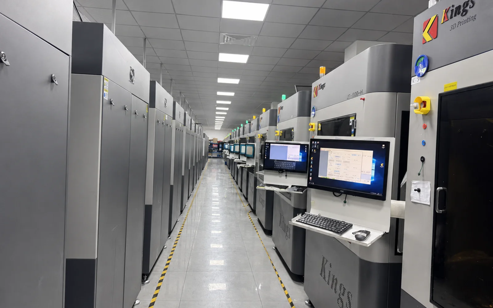 OUJI 3D printing workshop with industrial additive manufacturing equipment and technicians