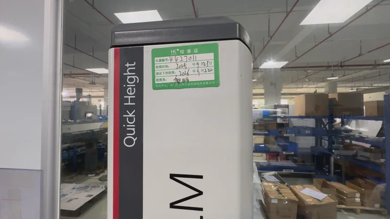 An instrument calibration label affixed to a height gauge at OUJI