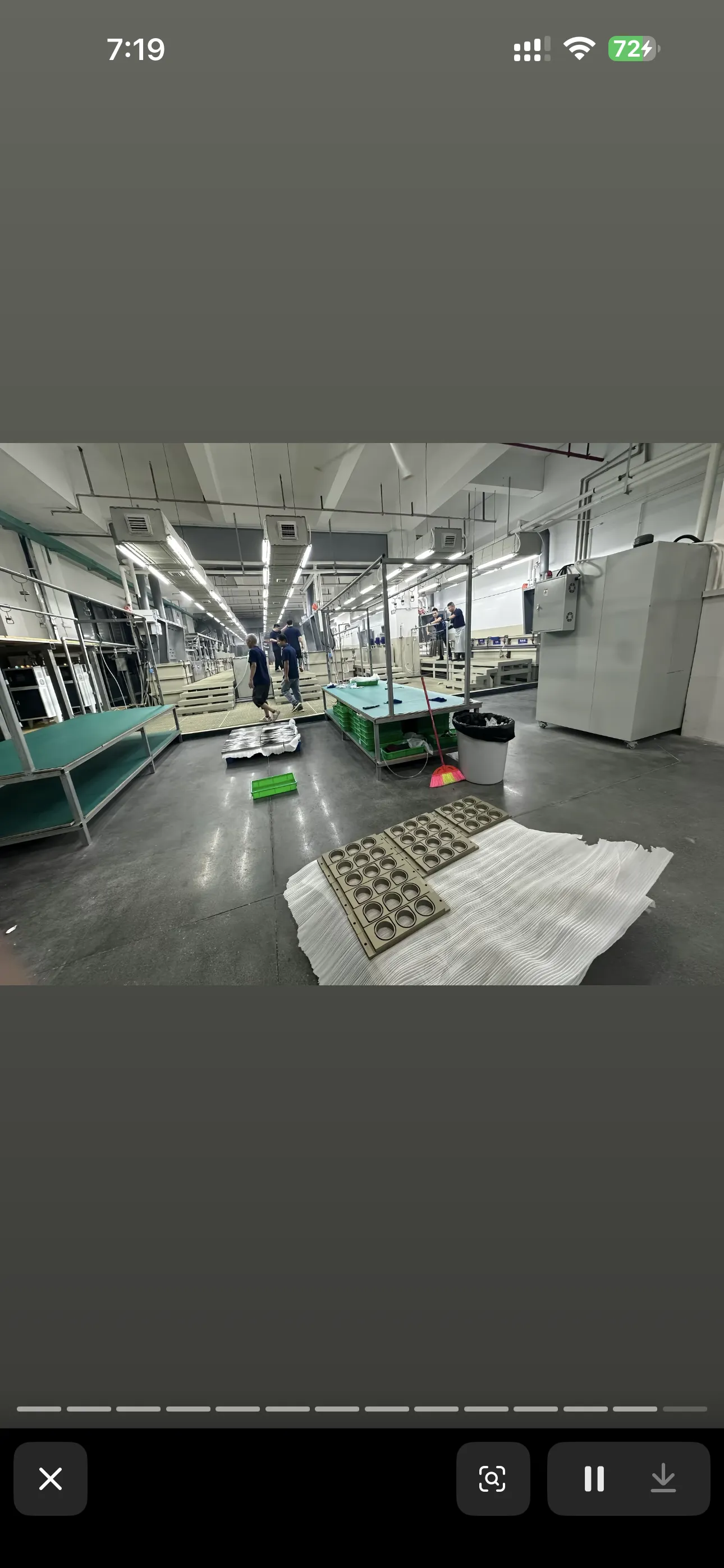 Production floor at one of OUJI's finishing partners, with parts staged for processing