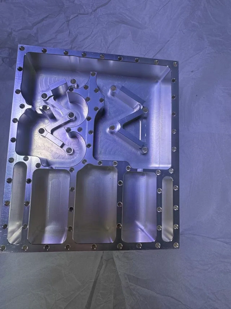 Accepted silver-plated RF housing from the 100-part OUJI order, photographed after the plating trials