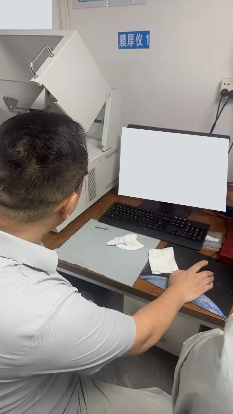 Coating-thickness inspection for this RF housing order at the plating partner; screen and document details redacted