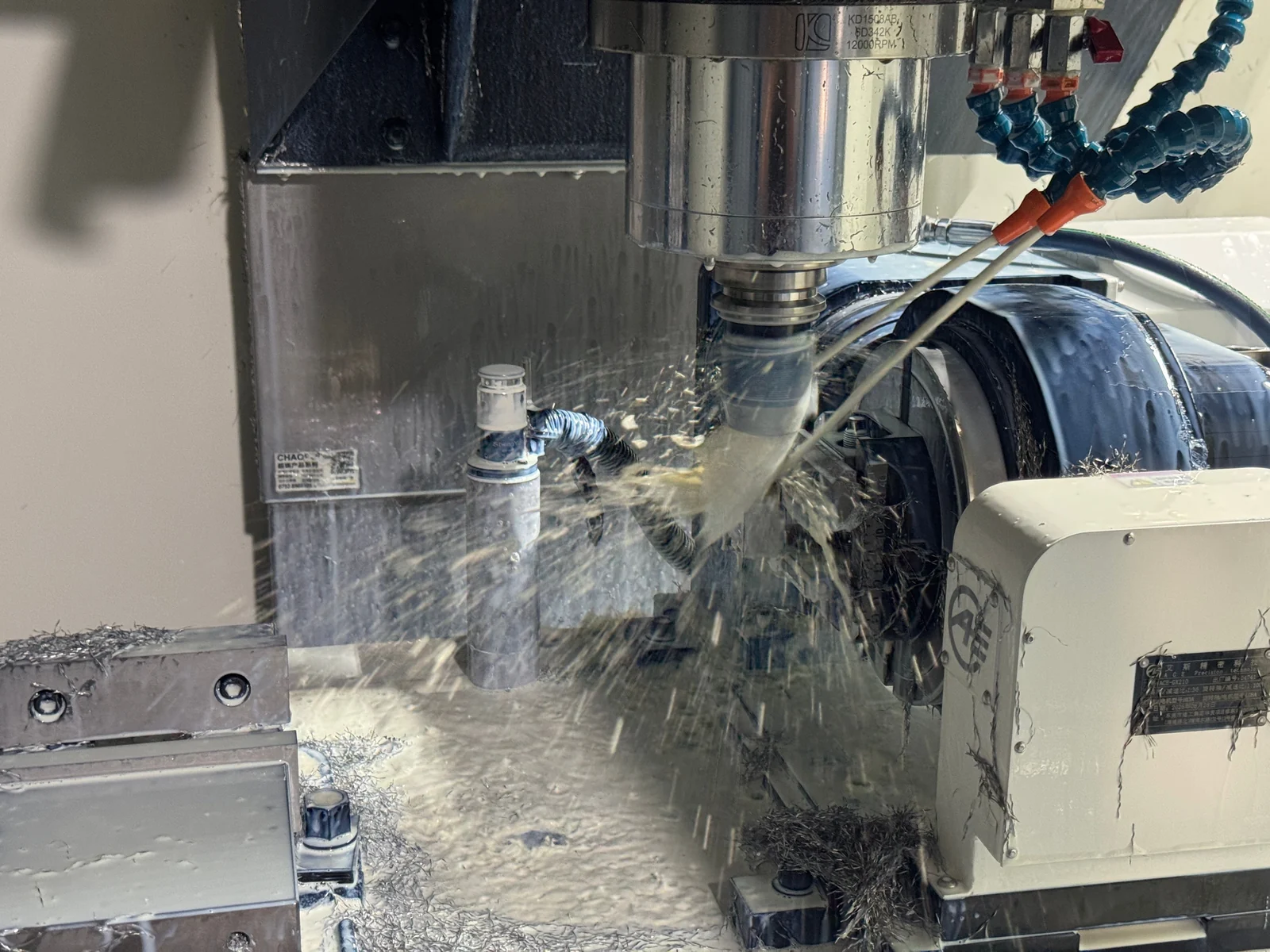 Coolant-assisted CNC machining of the clamped 304 stainless steel component