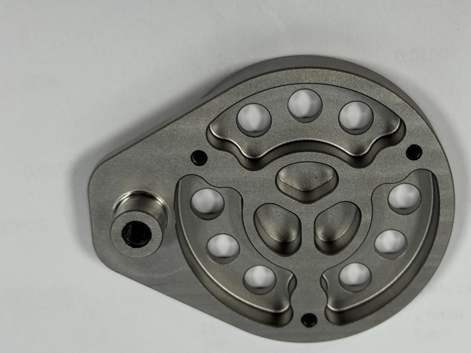 Finished anonymized AerMet 100 precision component after fine steel-bead blasting