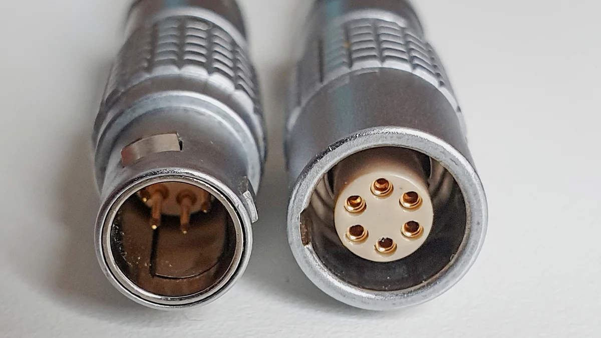 Male and female circular six-pin connectors with gold-plated contacts