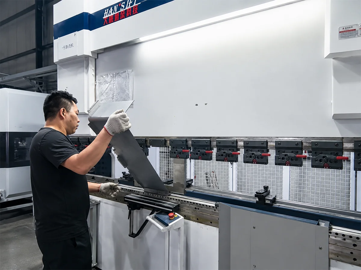 Press brake forming a custom sheet metal enclosure panel
